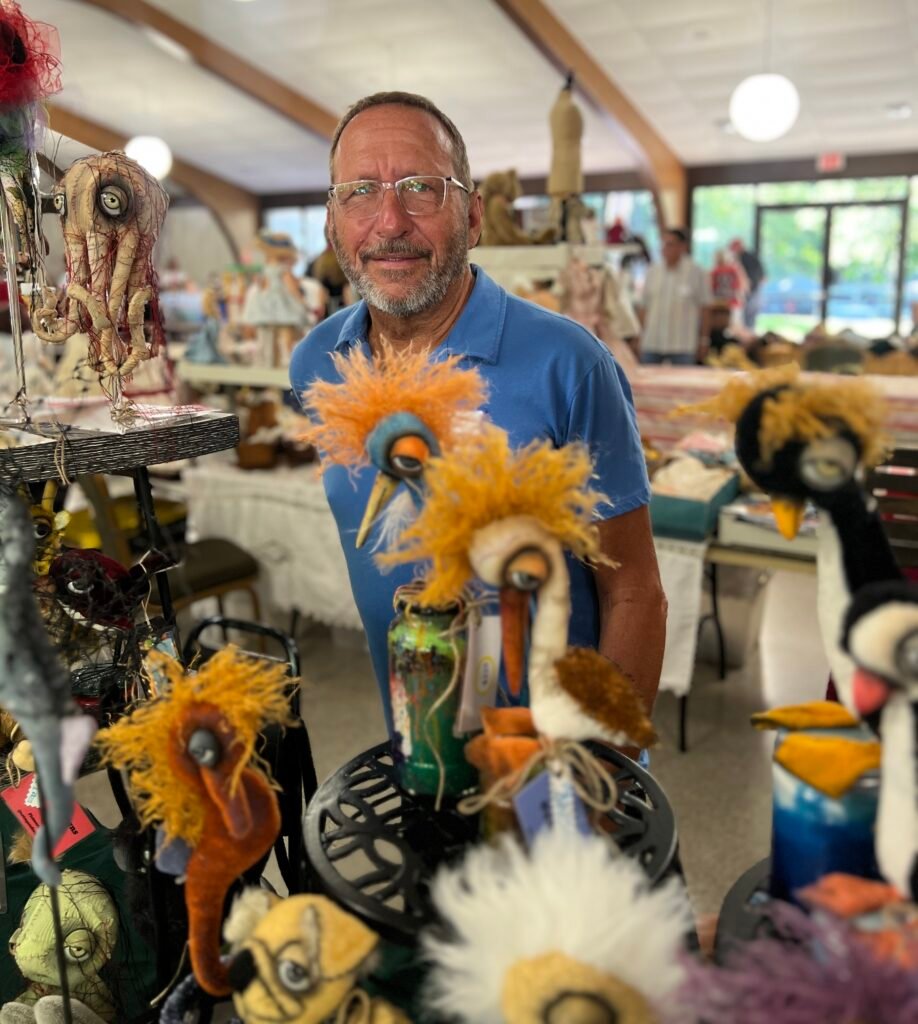 Art Rogers surrounded by his creations